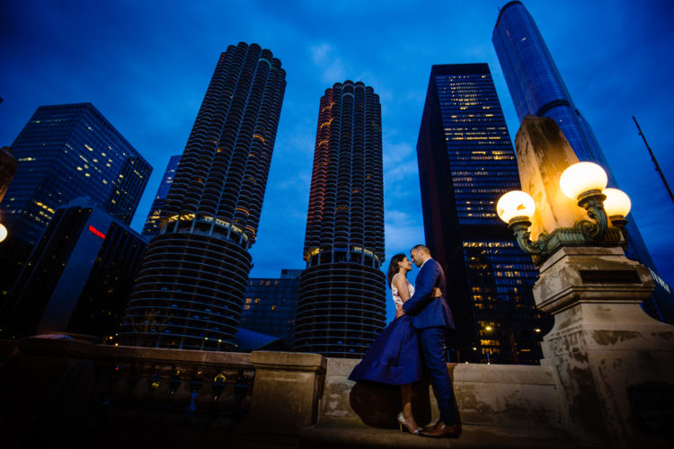 Couple hugging during destination engagement photo session in Downtown Chicago